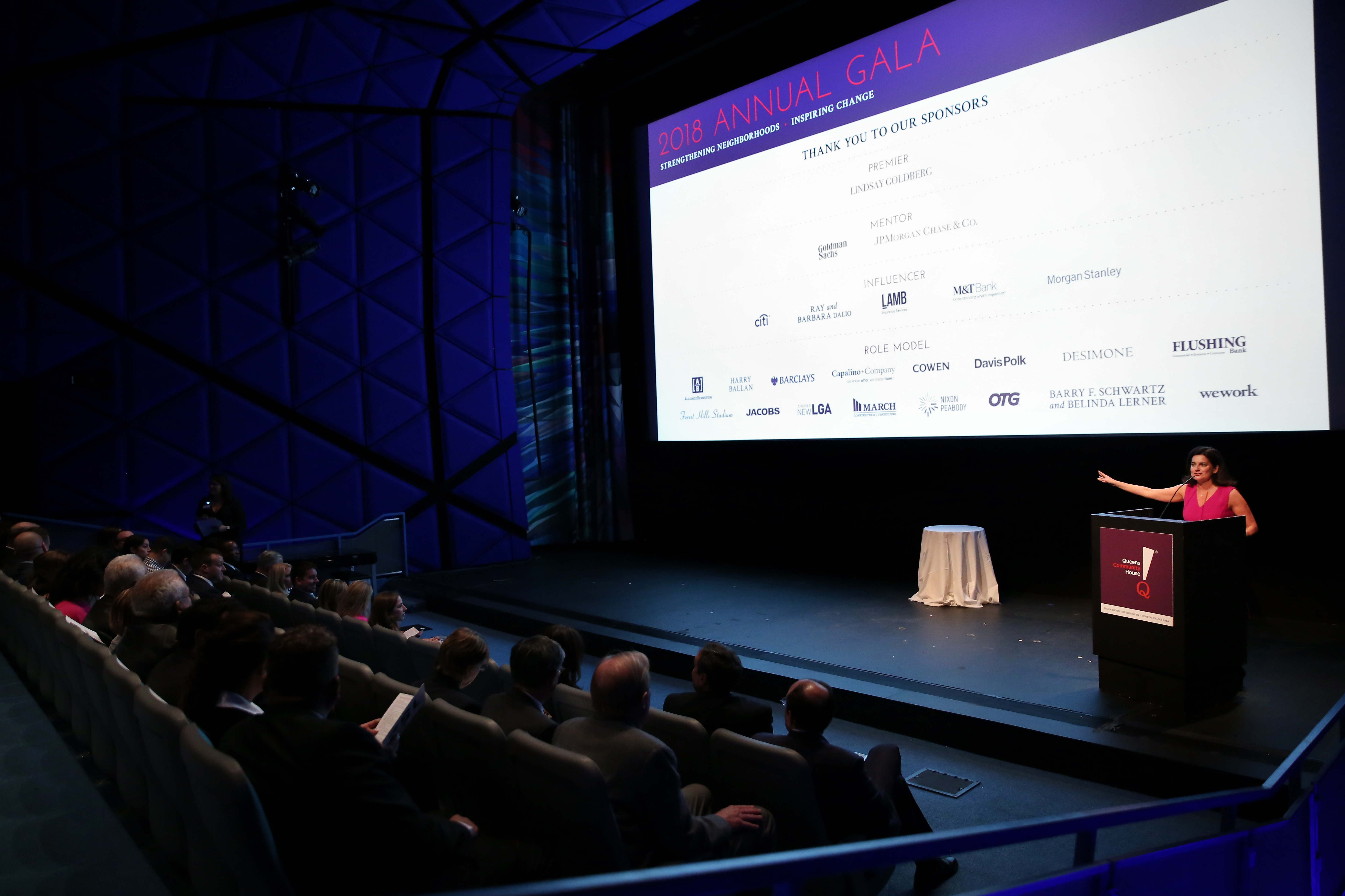 Person presenting in a large room