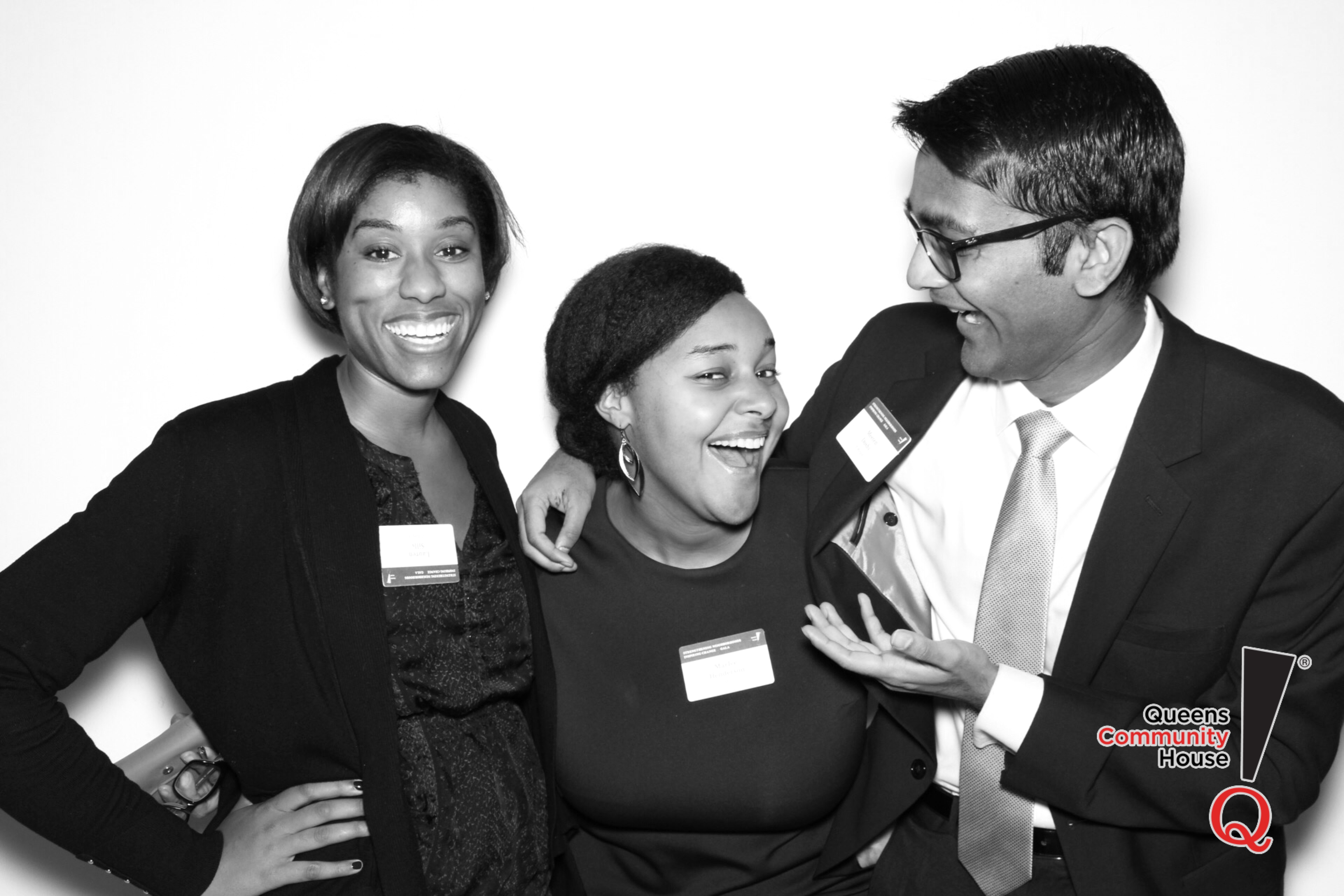 Three people smiling and laughing